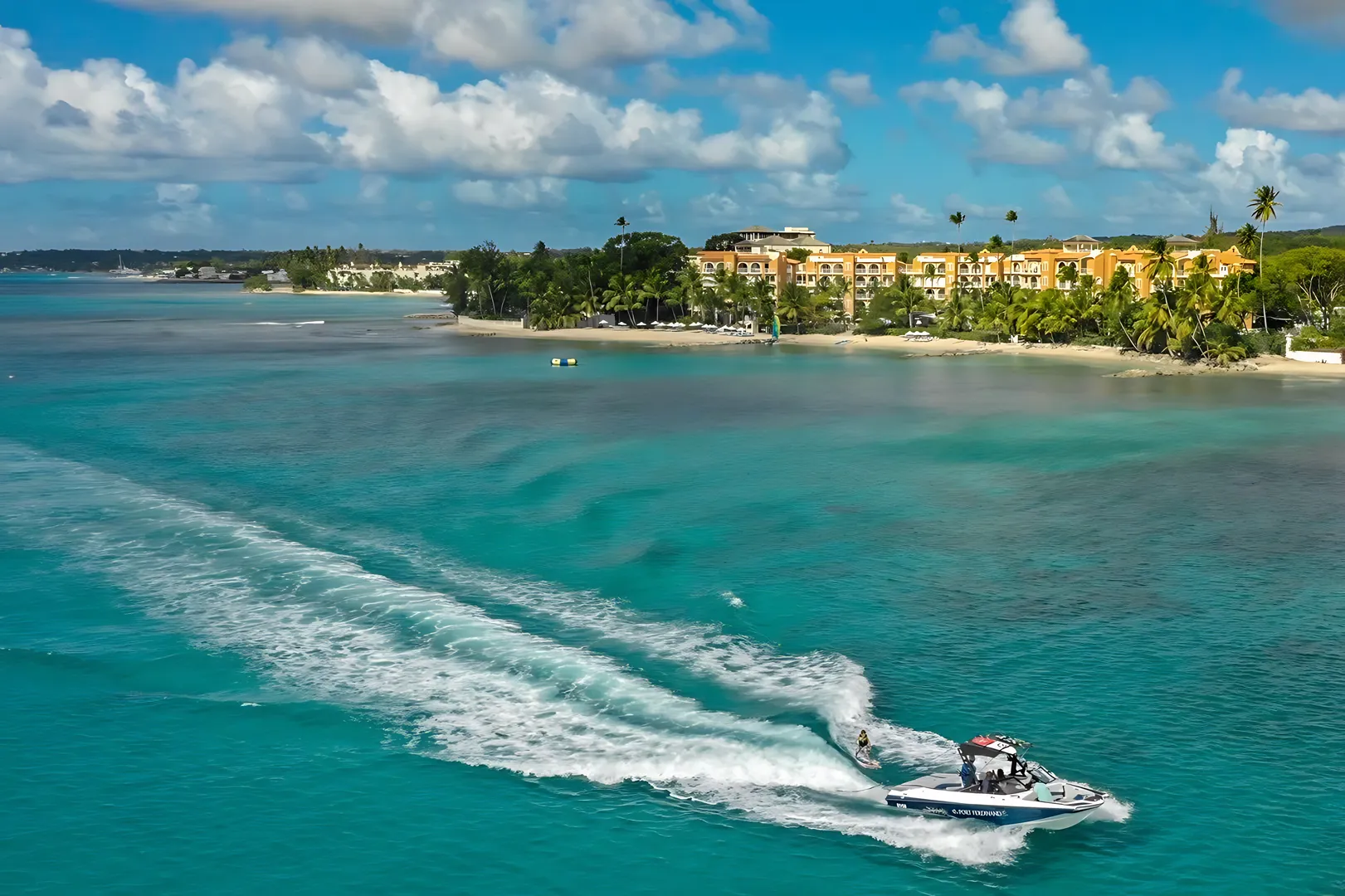 Caribbean Waters Aerial view of boat in turquoise Caribbean waters at Saint Peter's Bay