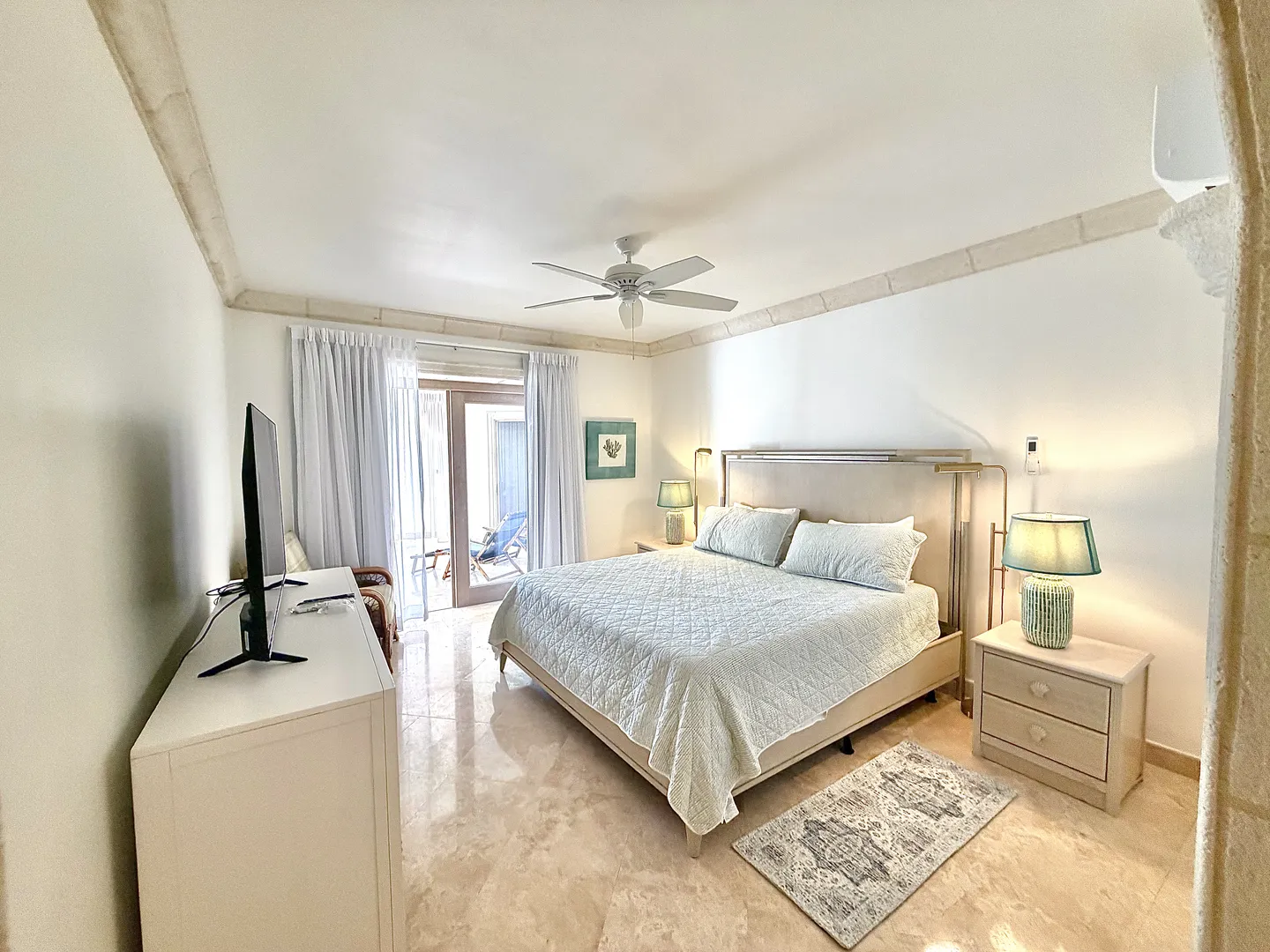 Cozy Bedroom Cozy bedroom with warm lighting at Saint Peter's Bay apartment